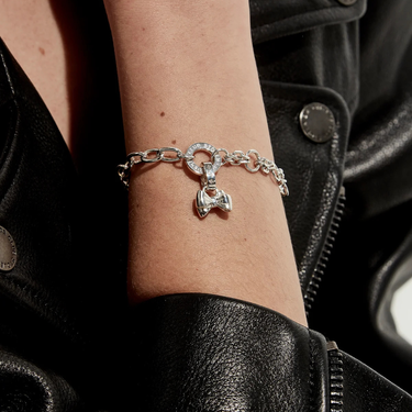 DOUBLE BOW CHARM - STERLING SILVER