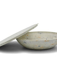 Serving bowl with a lid — the round
